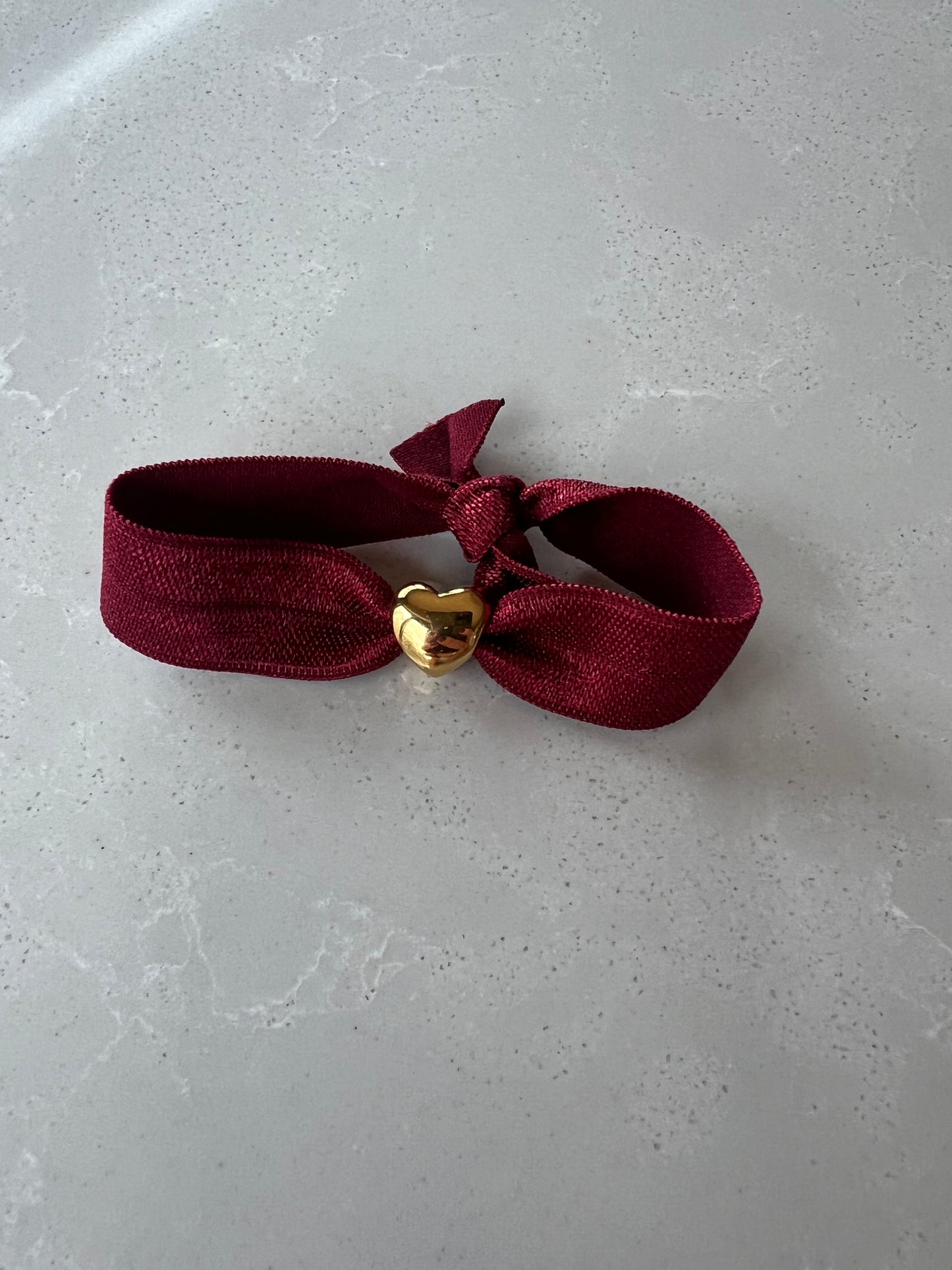 Elastic gold heart bracelet , burgundy