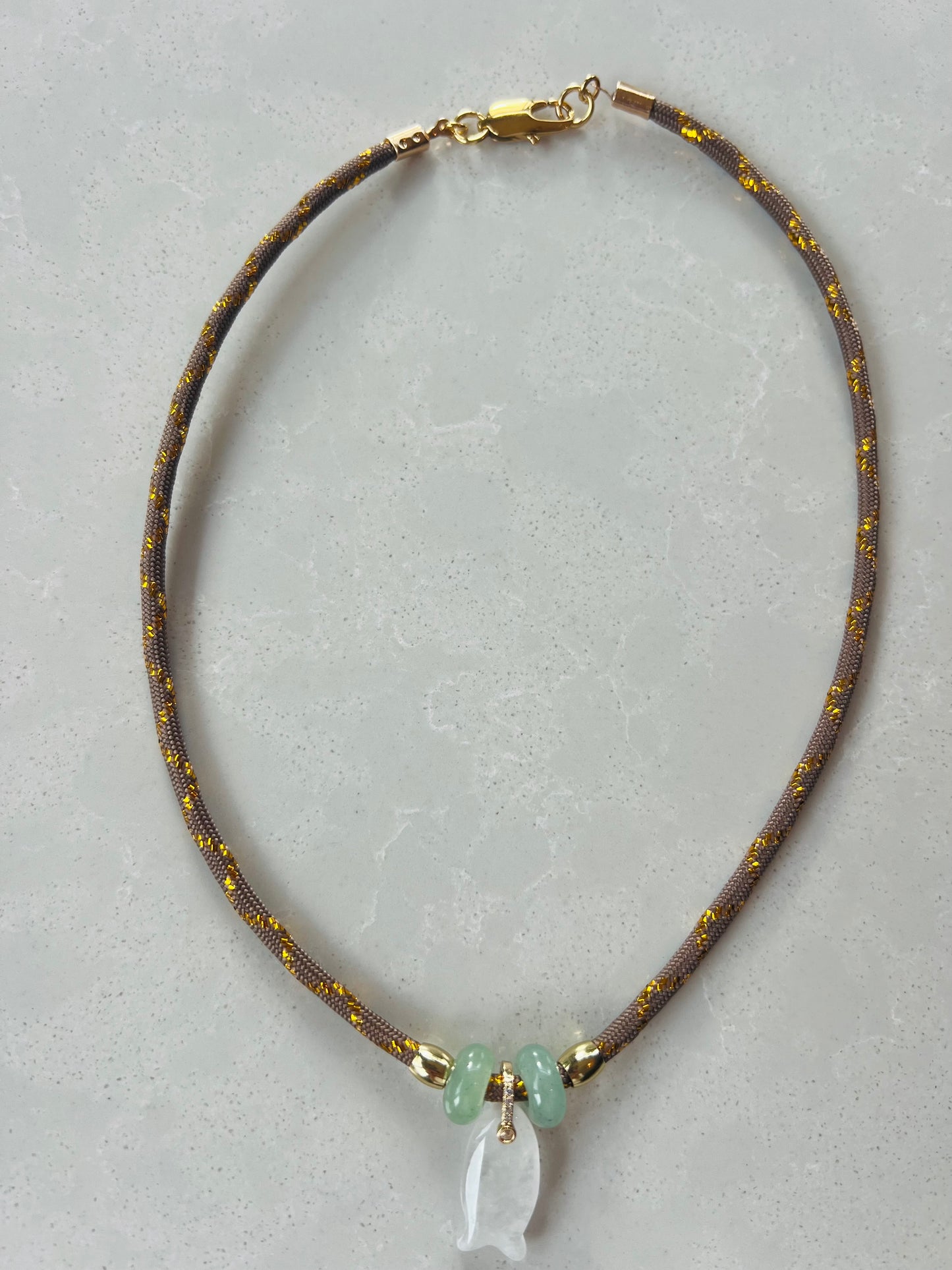 Short cord necklace with emerald Fish
