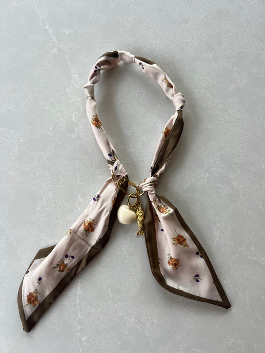 Scarf necklace with a front tie closure and removable charms #77