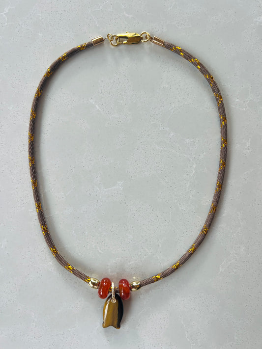 Short cord necklace with emerald Fish #113