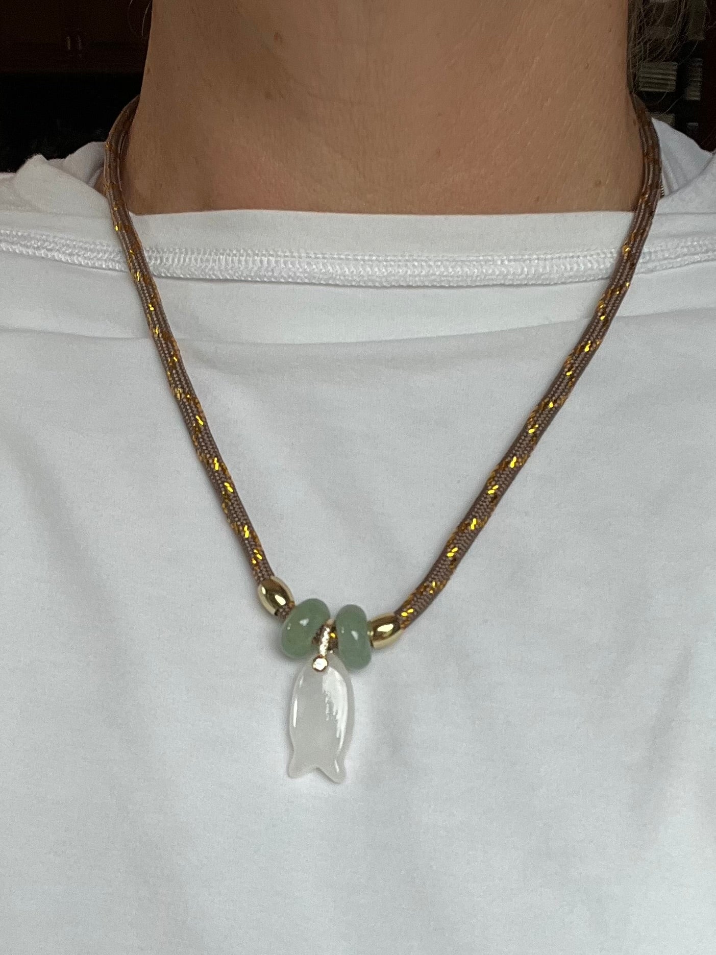 Short cord necklace with emerald Fish