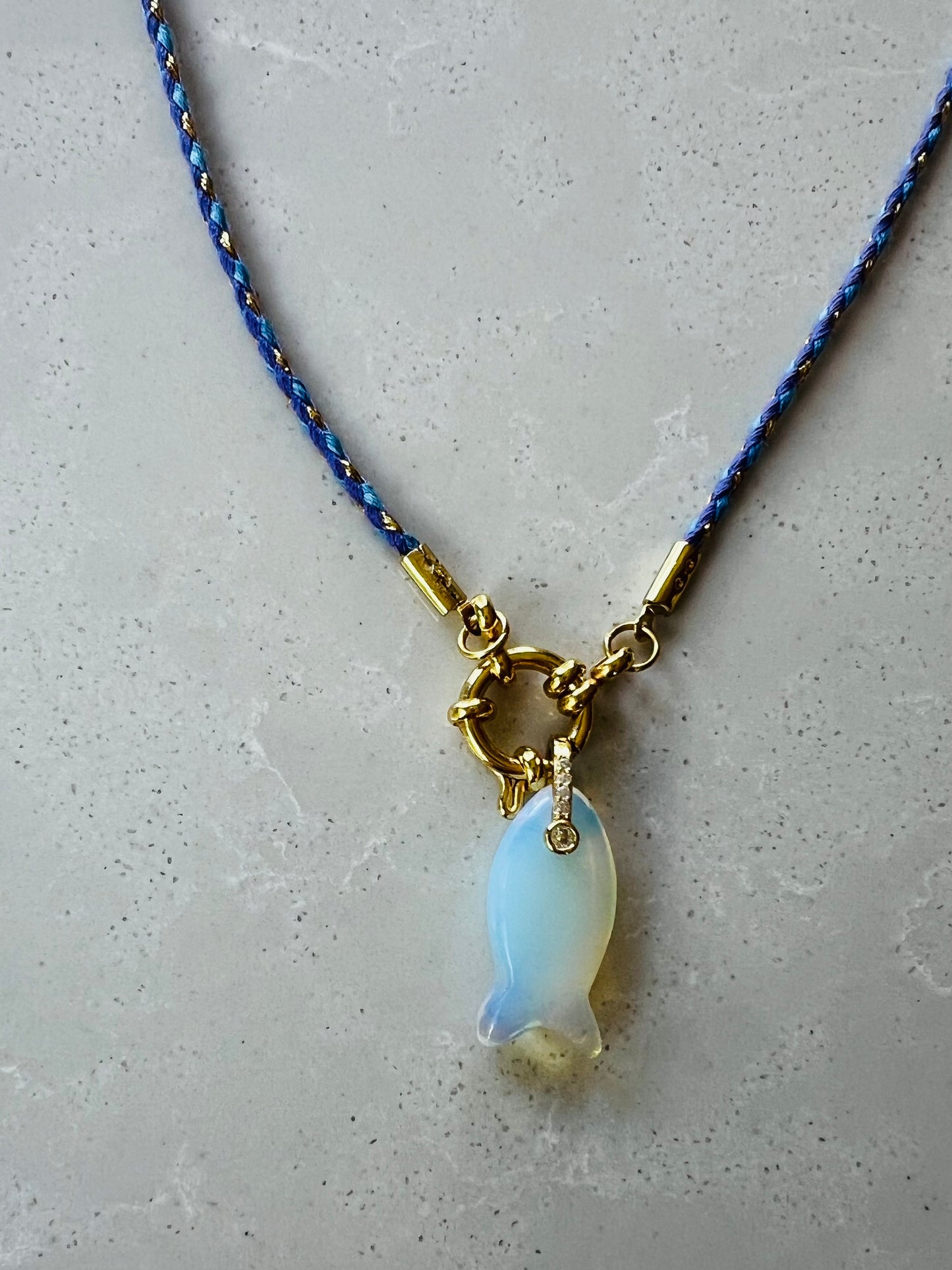 Thin cord necklace with emerald Fish charm #100