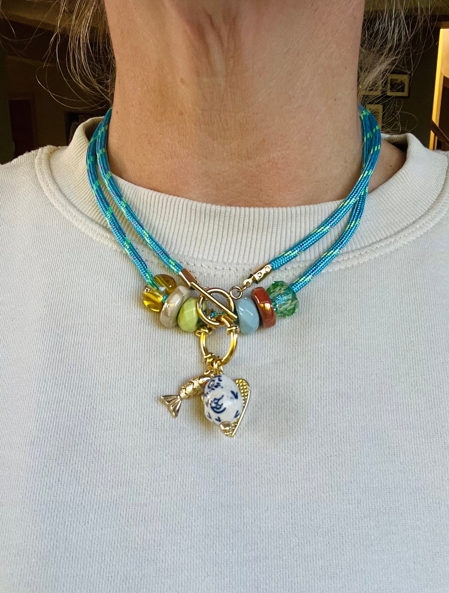 Cord necklace with ceramic beads and charms #09