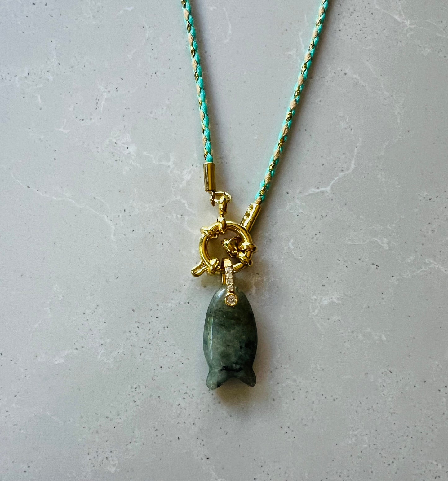 Thin cord necklace with emerald Fish charm #105