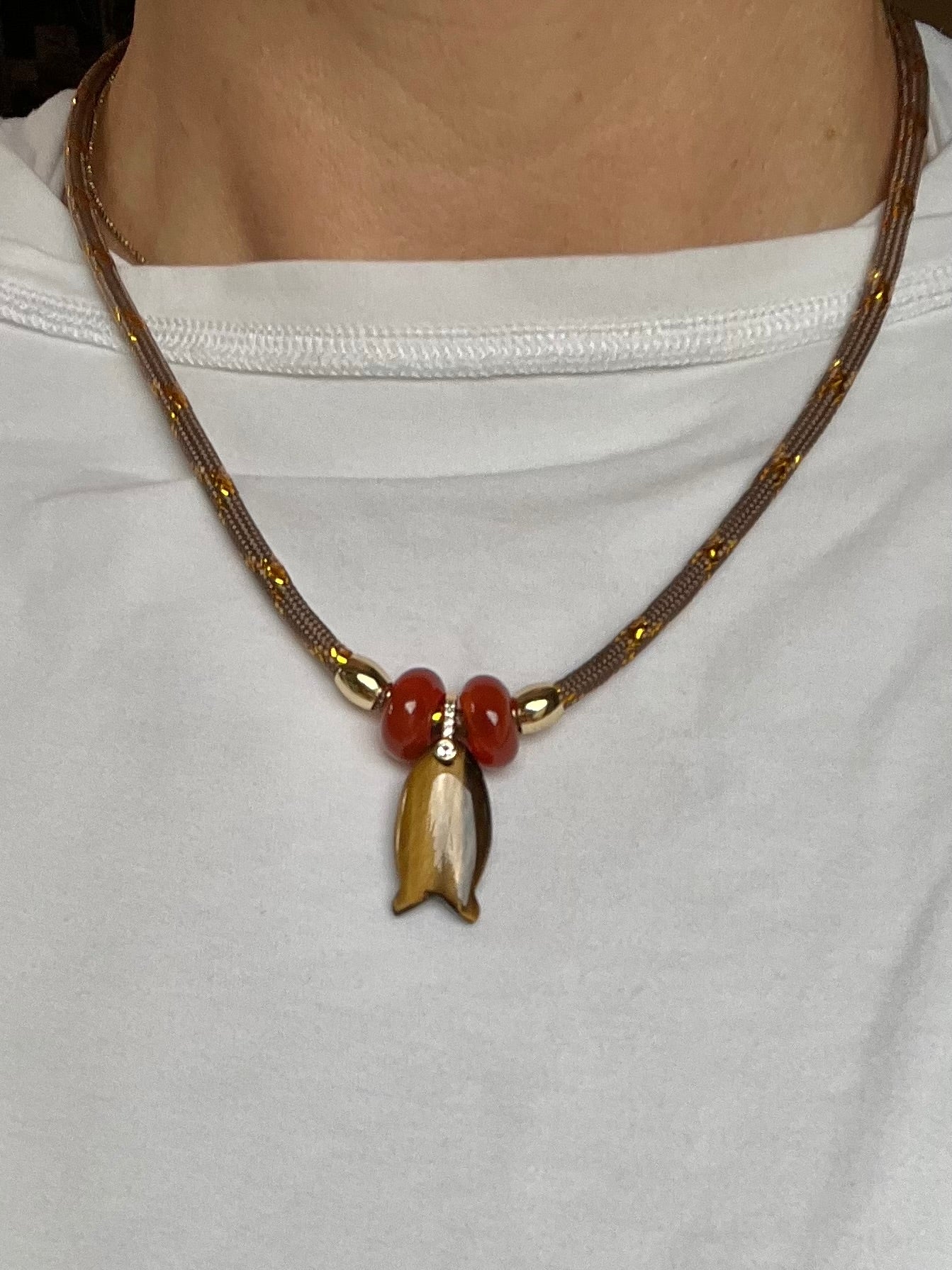 Short cord necklace with emerald Fish