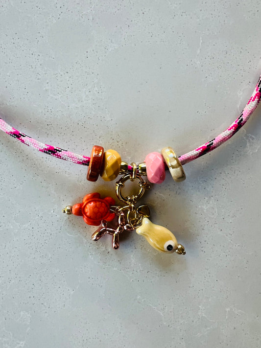 Cord necklace with ceramic beads and charms #10